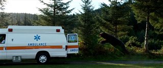 COCAINE BEAR Movie Clip - Cocaine Bear chases down an ambulance Video Thumbnail